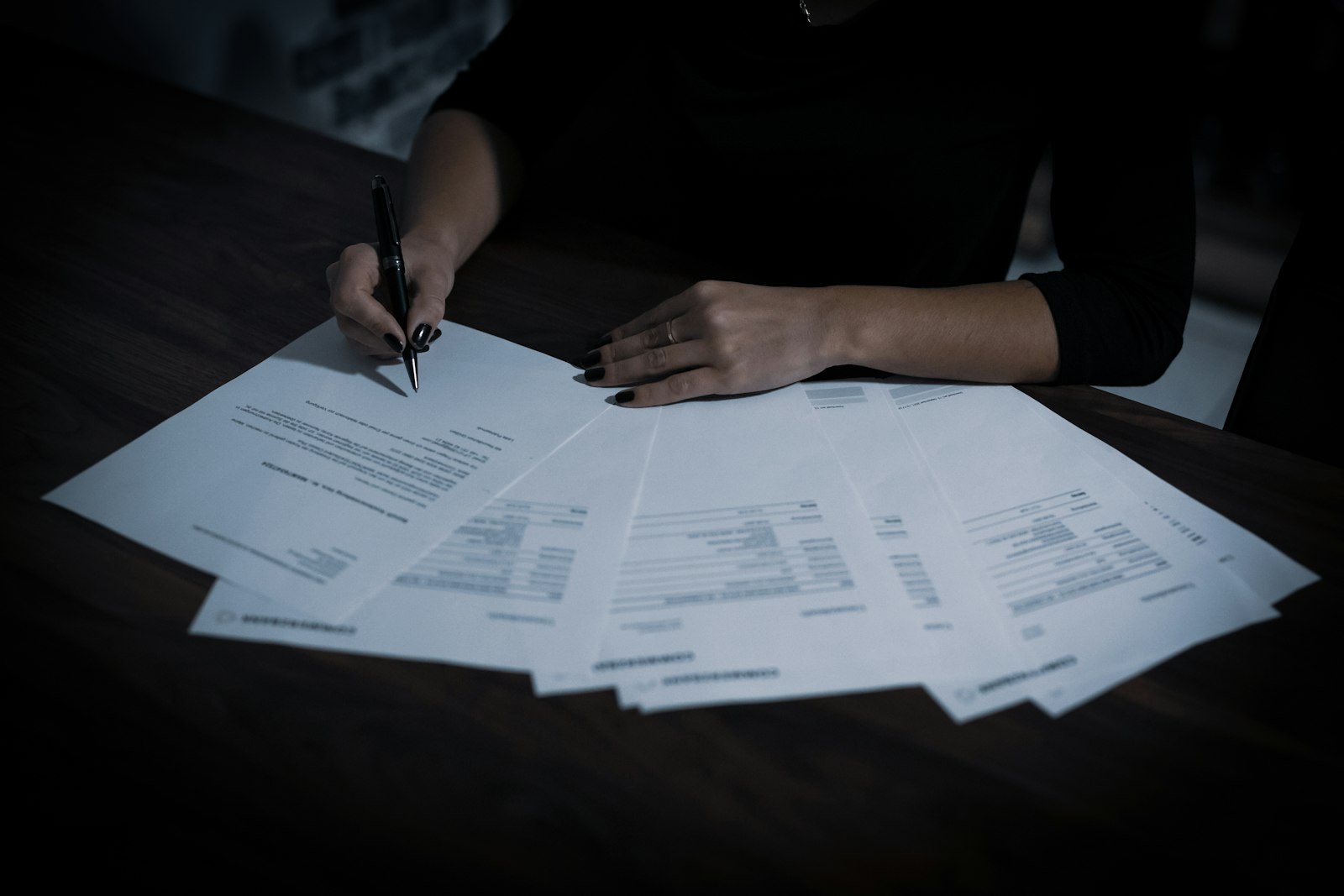 State tax forms on a desk for claiming a state-only home office deduction