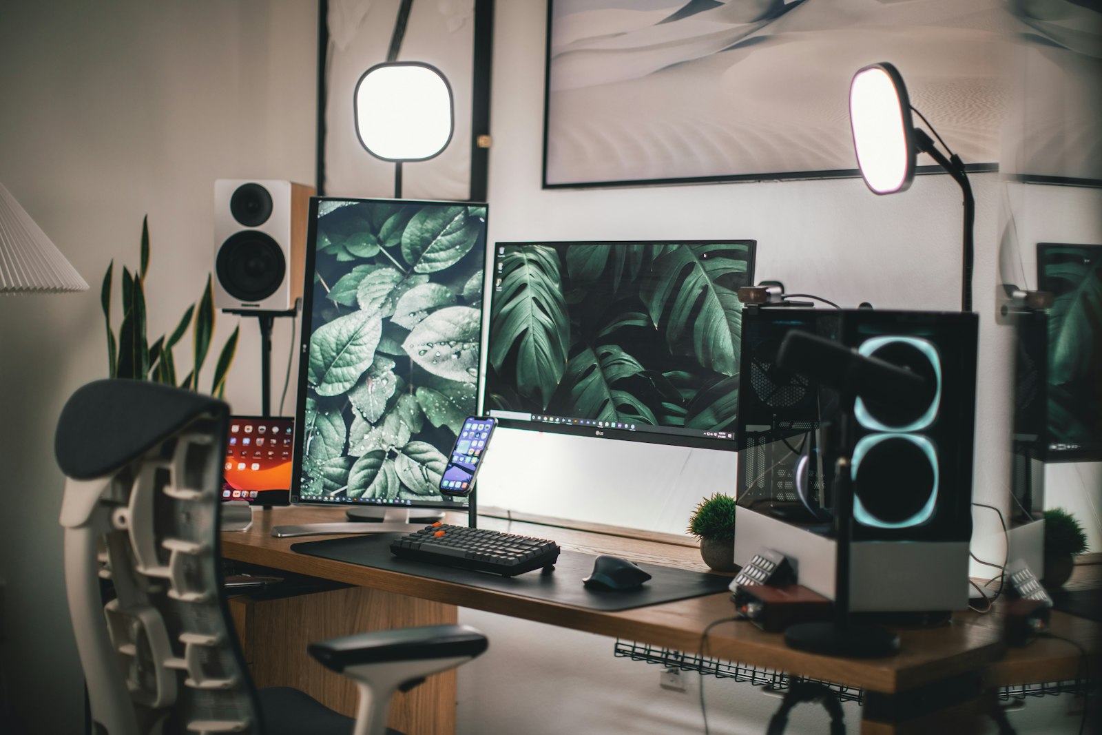 Minimal monitor and keyboard on a clean white wood desk for a budget home office build
